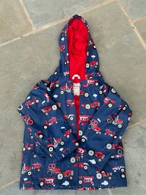 Hatley size 6 Children's Navy Raincoat with Red Tractor Print
